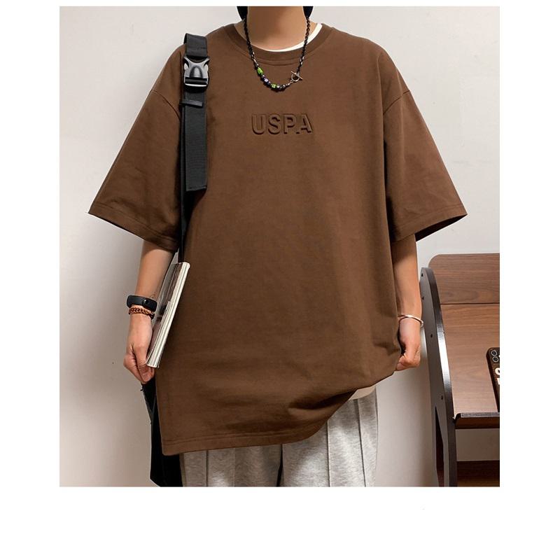 Camiseta de manga corta de algodón puro con cuello redondo y diseño sencillo y versátil con hombros caídos y ajuste holgado.